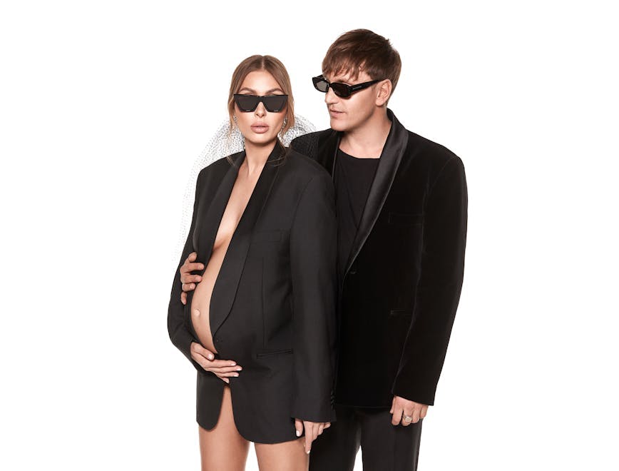 clothing sleeve long sleeve person suit overcoat coat blazer female sunglasses