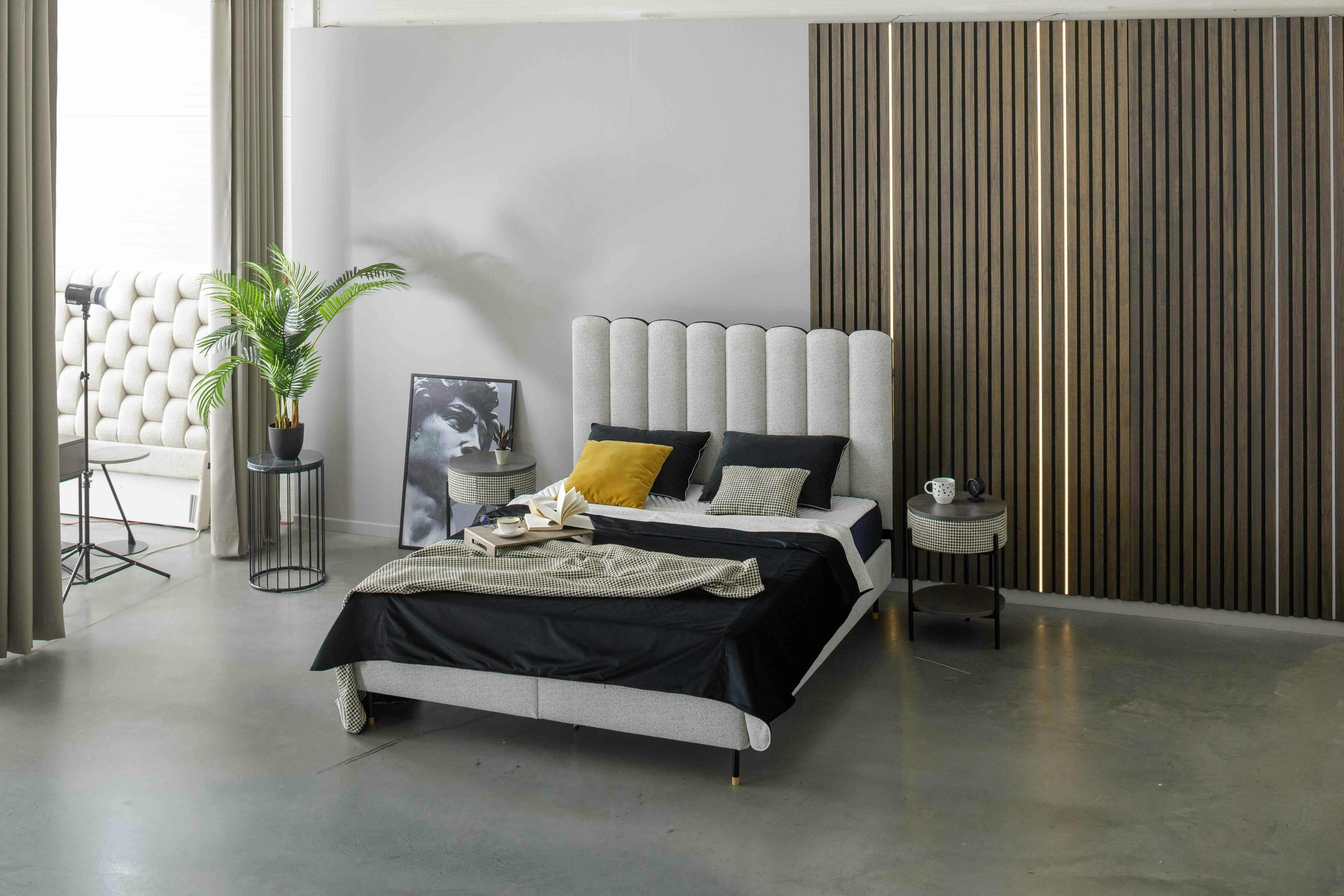 indoors interior design wood panels floor plant bed furniture