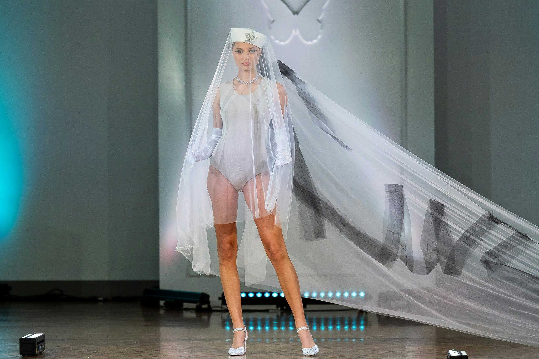 fashion bridal veil clothing dress formal wear gown person wedding wedding gown